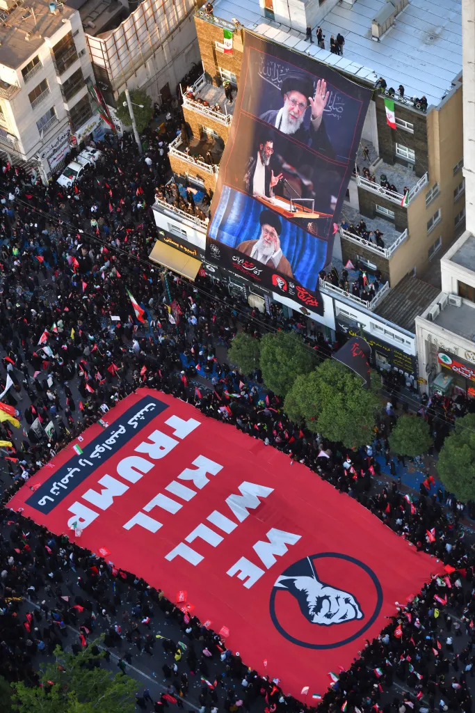 A giant banner calling for the death of Trump is unfurled in the streets of Iran during the Ali Khamenei's funeral.