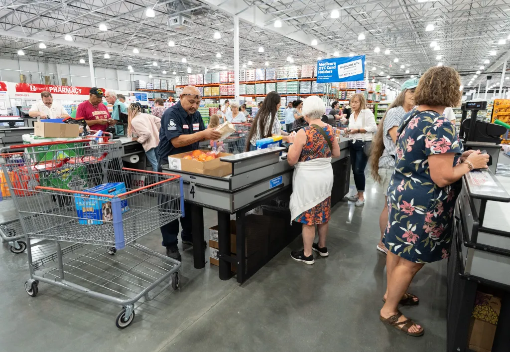 People checking out at Costco.
