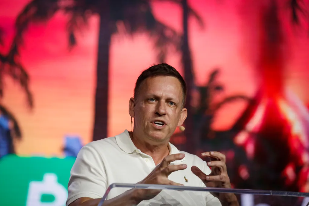 Peter Thiel speaking and gesturing at the Bitcoin 2022 Conference.