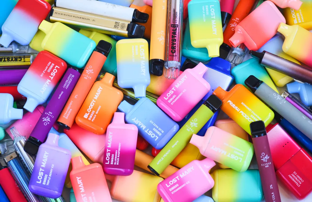 Photo illustration of single-use discarded vapes.