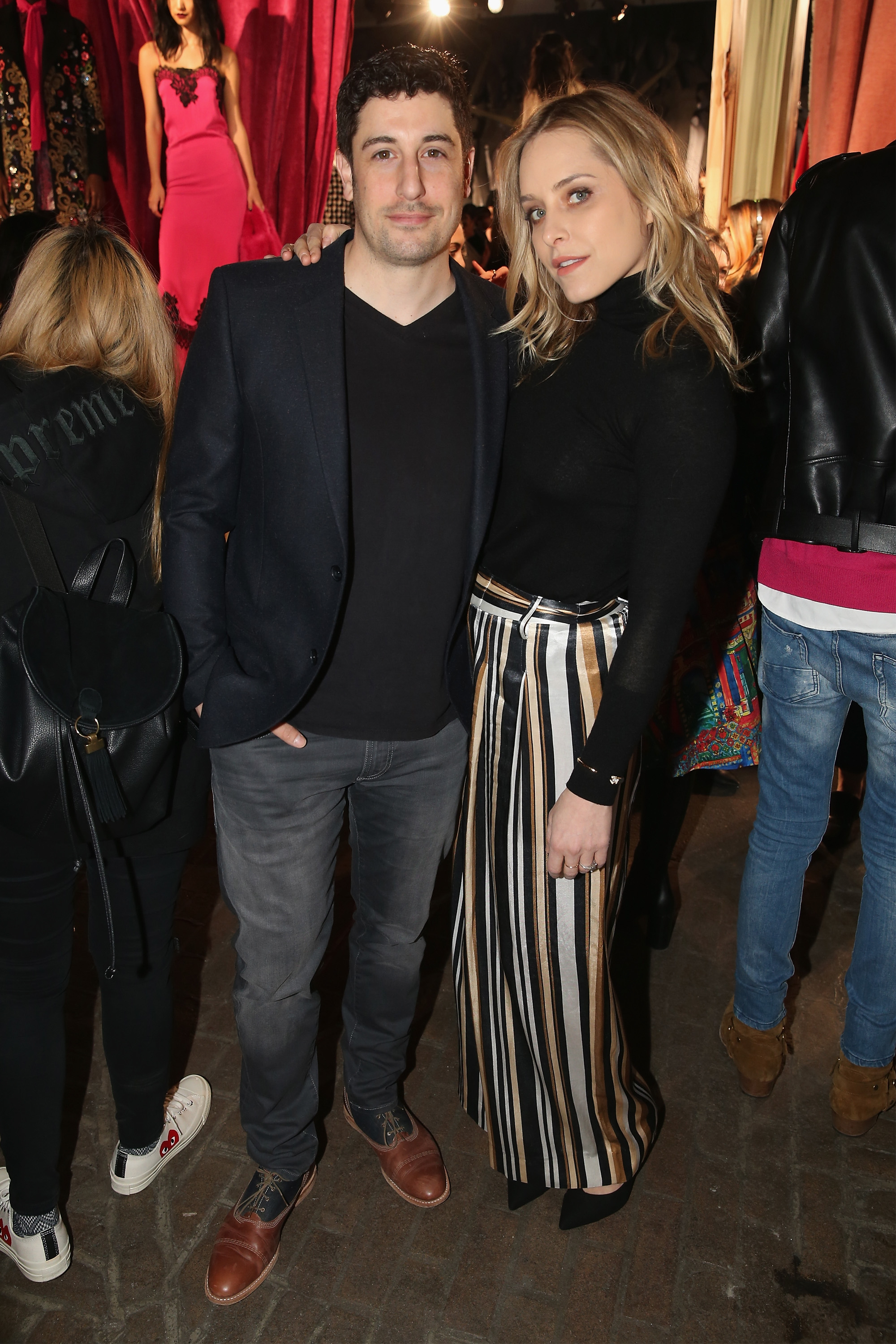 Jason Biggs (L) and Jenny Mollen attend the alice + olivia by Stacey Bendet Fall 2017 Presentation at Highline Stages on February 14, 2017 in New York City.