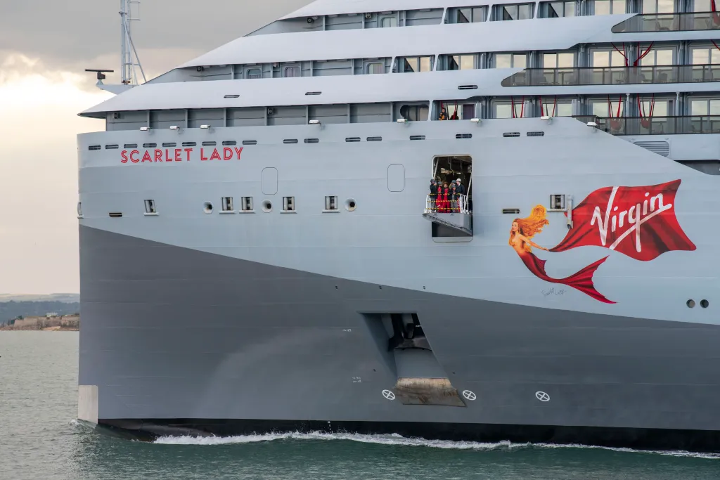 The "Scarlet Lady," operated by Virgin Voyages, was barred from docking in Turkey after authorities canceled its planned port calls.
