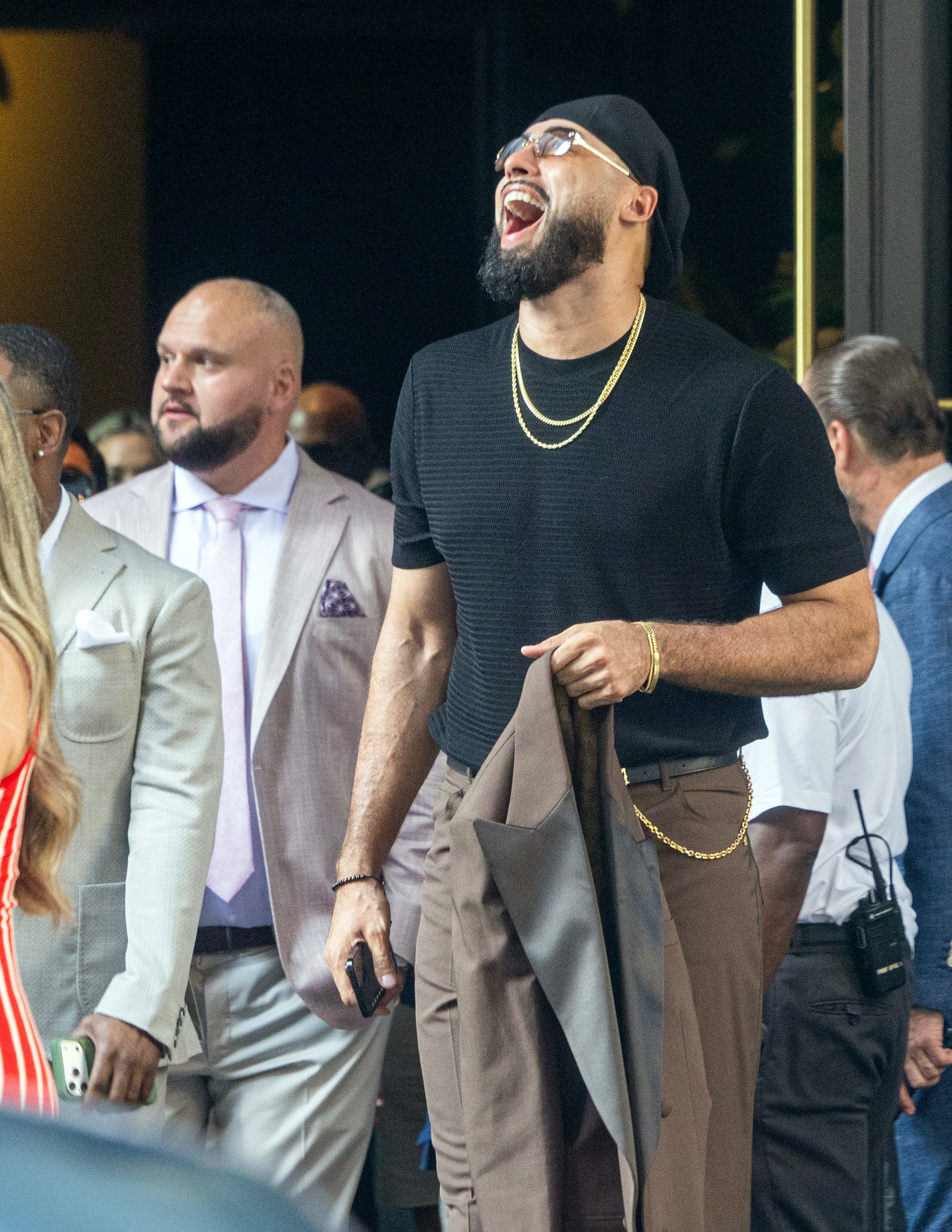 Ross Travis exits The Ritz Carlton Hotel in New York.