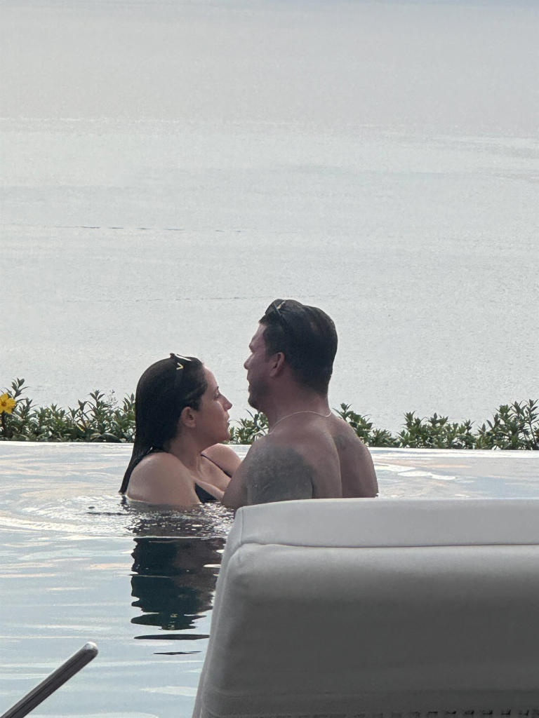 Jax Taylor and Lori Krebs looking at each other in a pool in Puerto Vallarta.