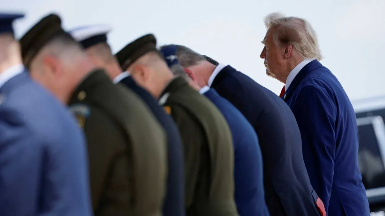 ‘Pathetic’ Trump blasted for just ‘staring off into the abyss’ at dignified transfer