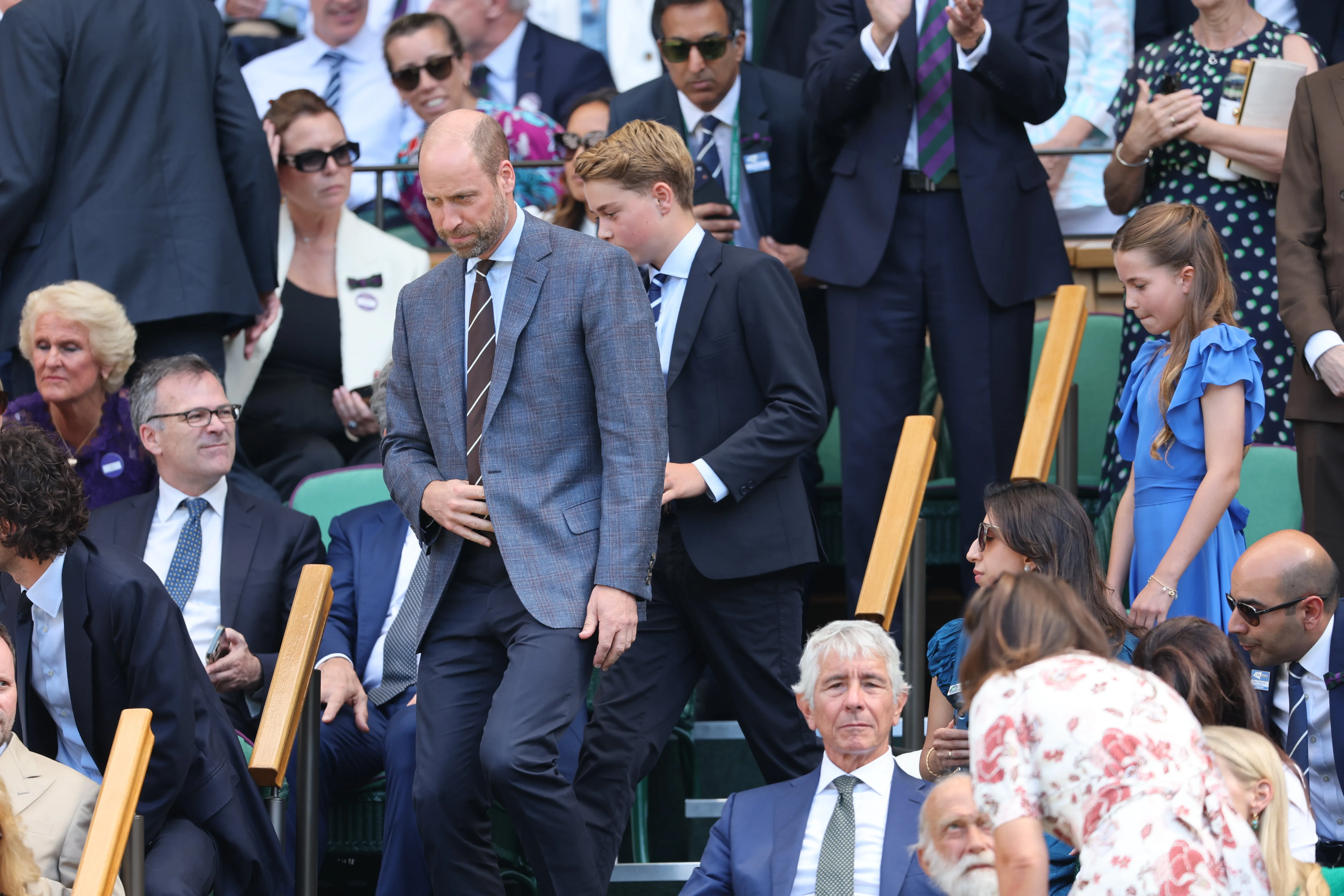 Prince William and his children, Prince George and Princess Charlotte, in the stands at the Wimbledon Tennis Championships.
