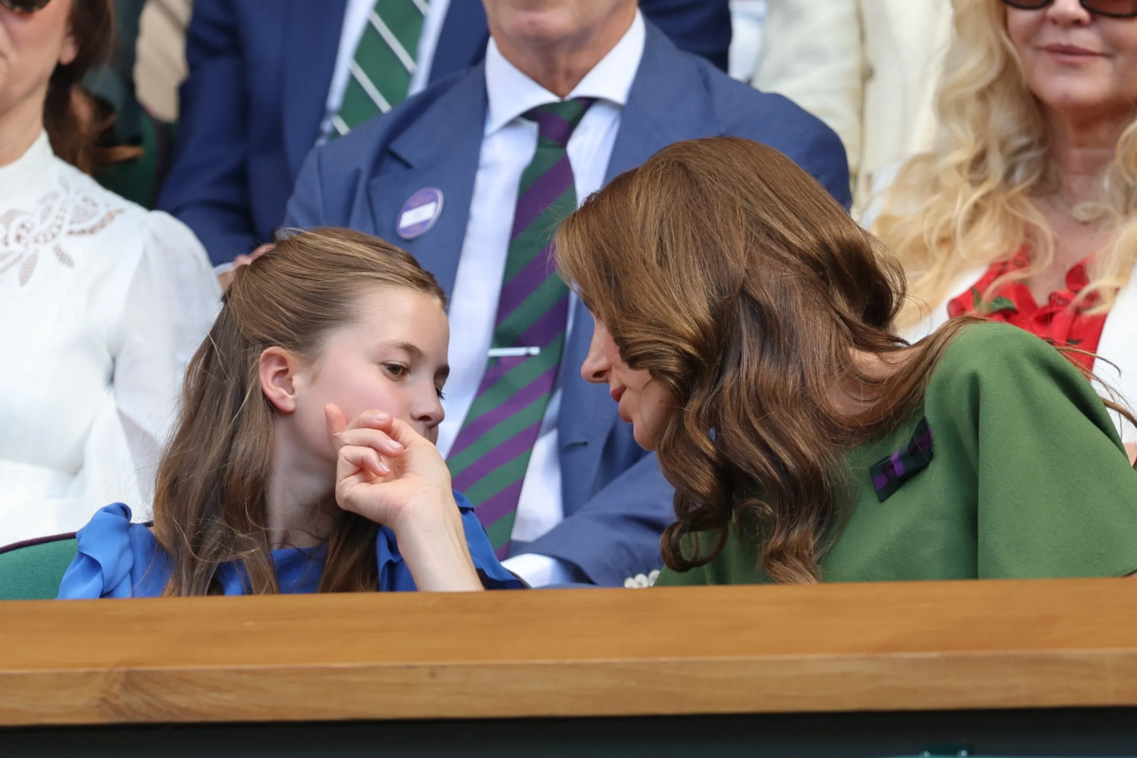 Princess Kate Middleton speaking with Princess Charlotte at the Wimbledon tennis championships.