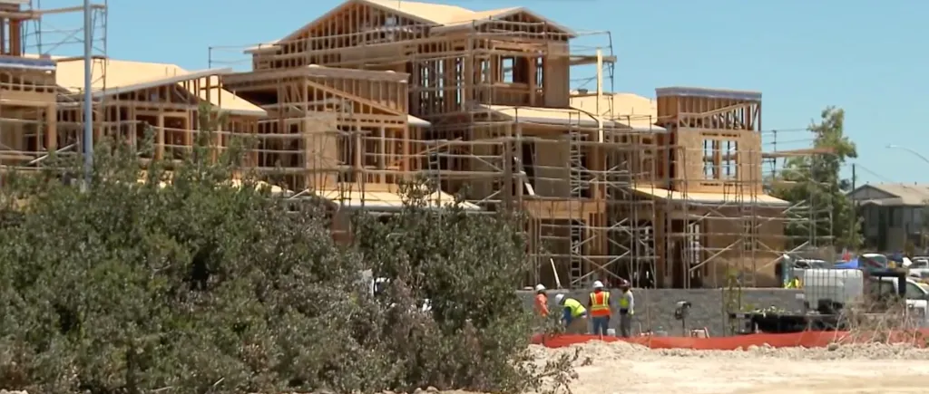 Construction workers building a new home development.
