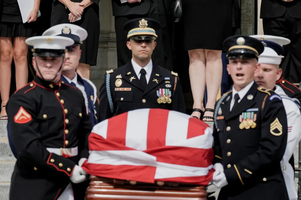 Pallbearers carry the casket of late U.S. Senator Lindsey Graham.