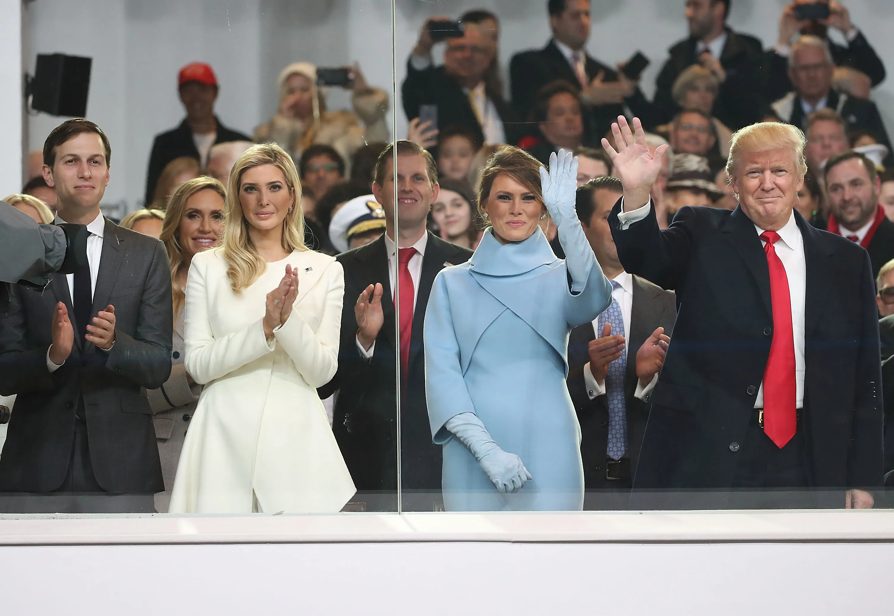 Donald Trump, Melania Trump, Ivanka Trump, and Jared Kushner at the presidential inauguration parade reviewing stand.