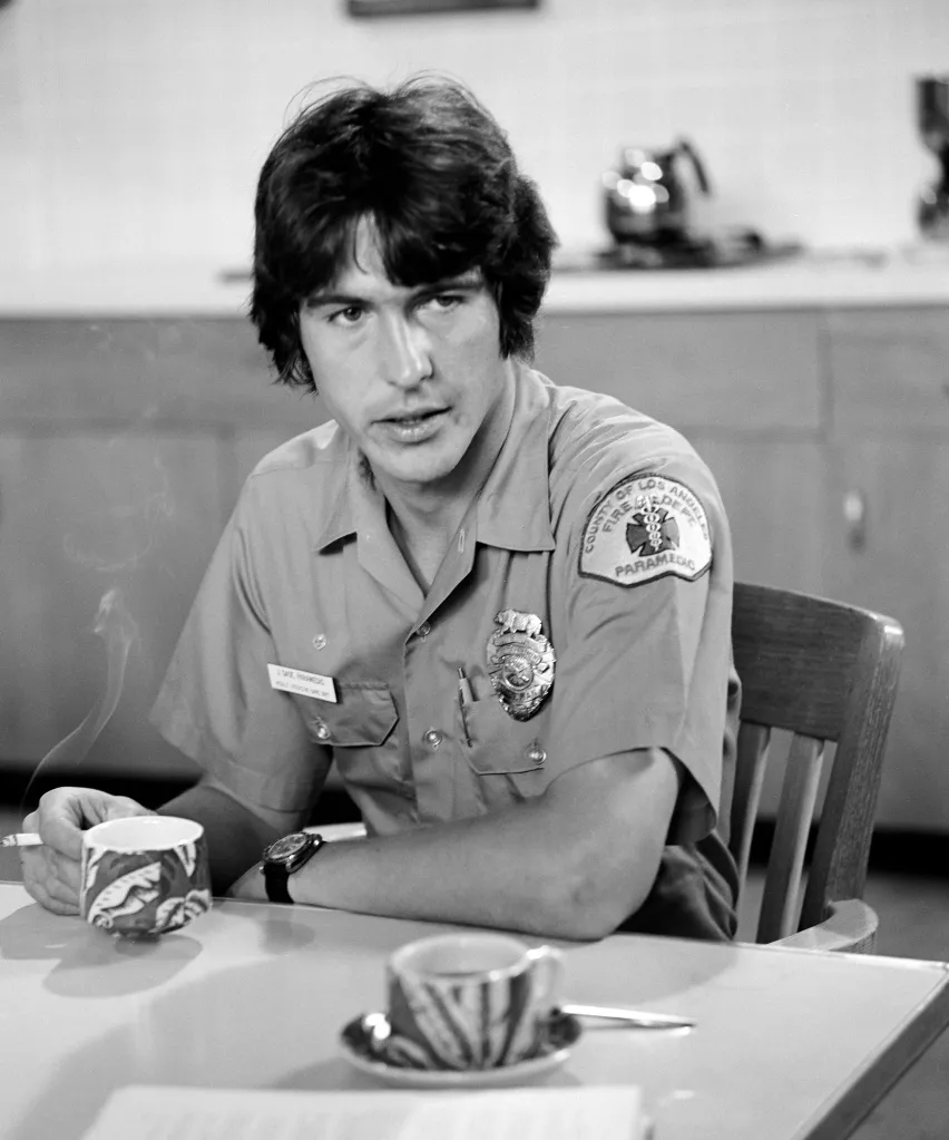 Randolph Mantooth as Paramedic John Gage in Emergency!, smoking and drinking coffee.