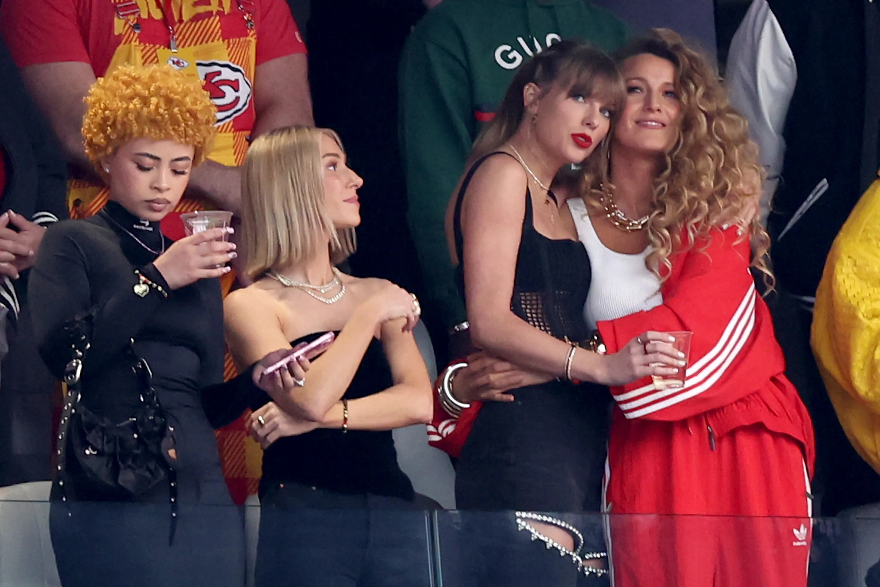 Rapper Ice Spice, singer Taylor Swift, and actress Blake Lively at Super Bowl LVIII.