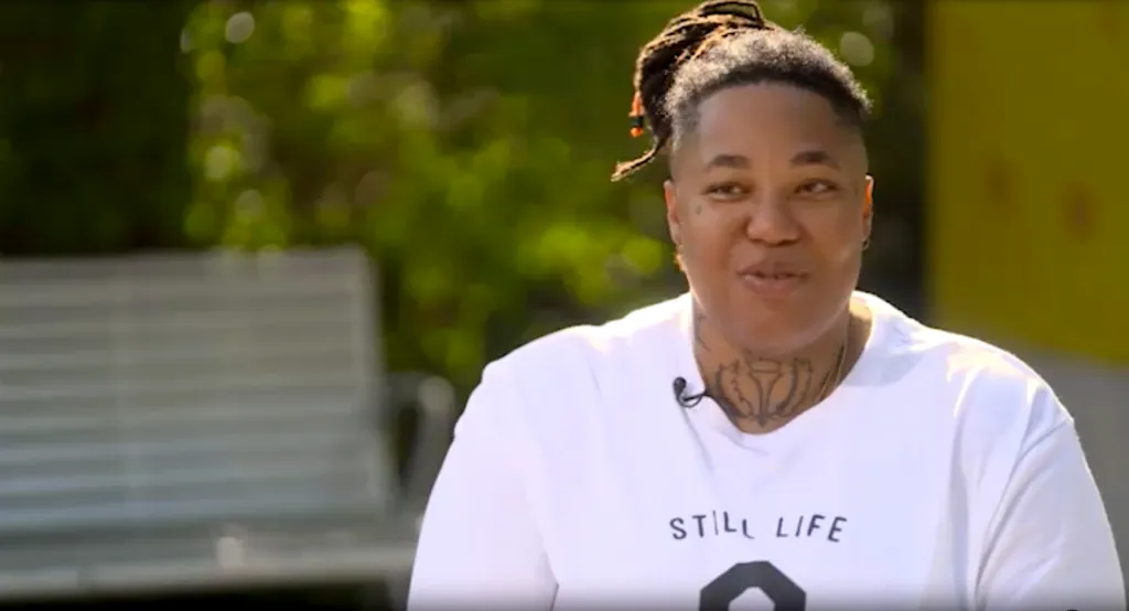 Rashan Williams, 41, of St. Petersburg, FL, wearing a white "Still Life" t-shirt, after having her pelvic organ prolapse condition fixed.