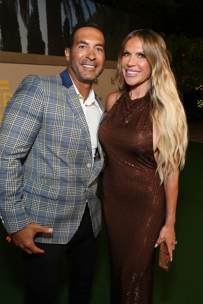 Ryan Boyajian and Jennifer Pedranti posing at "The Real Housewives of Orange County" season 20 premiere party.