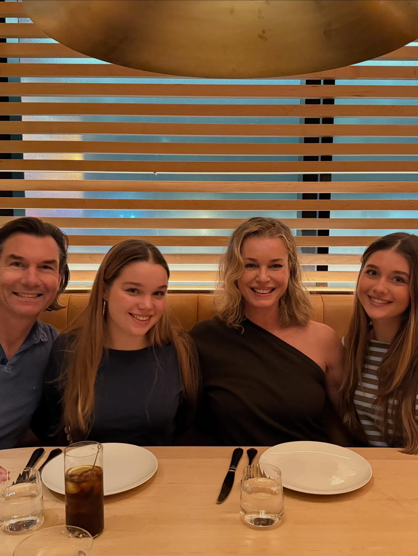Rebecca Romijn, Jerry O'Connell, Charlie, and Dolly at a restaurant.