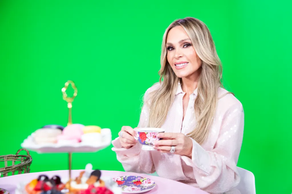 Tamra Judge from RHOC holding a teacup at the Page Six studio.
