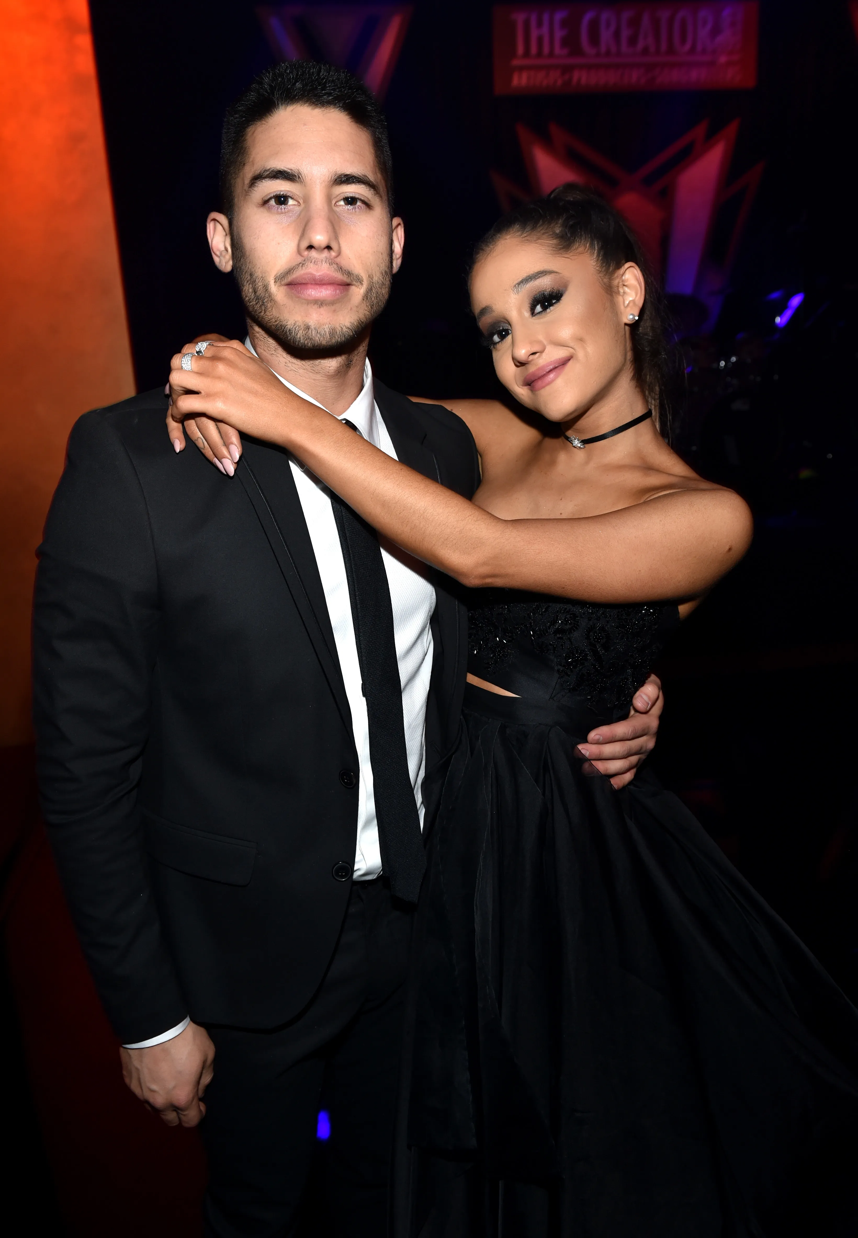 Recording artist Ariana Grande poses with Ricky Alvarez.