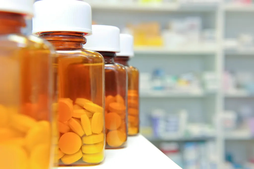 Row of pill bottles.