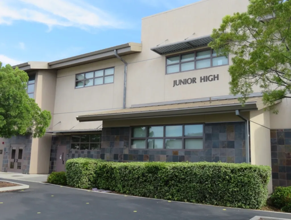 Front exterior of Rio Seco School, a two-story building with "JUNIOR HIGH" on its facade.