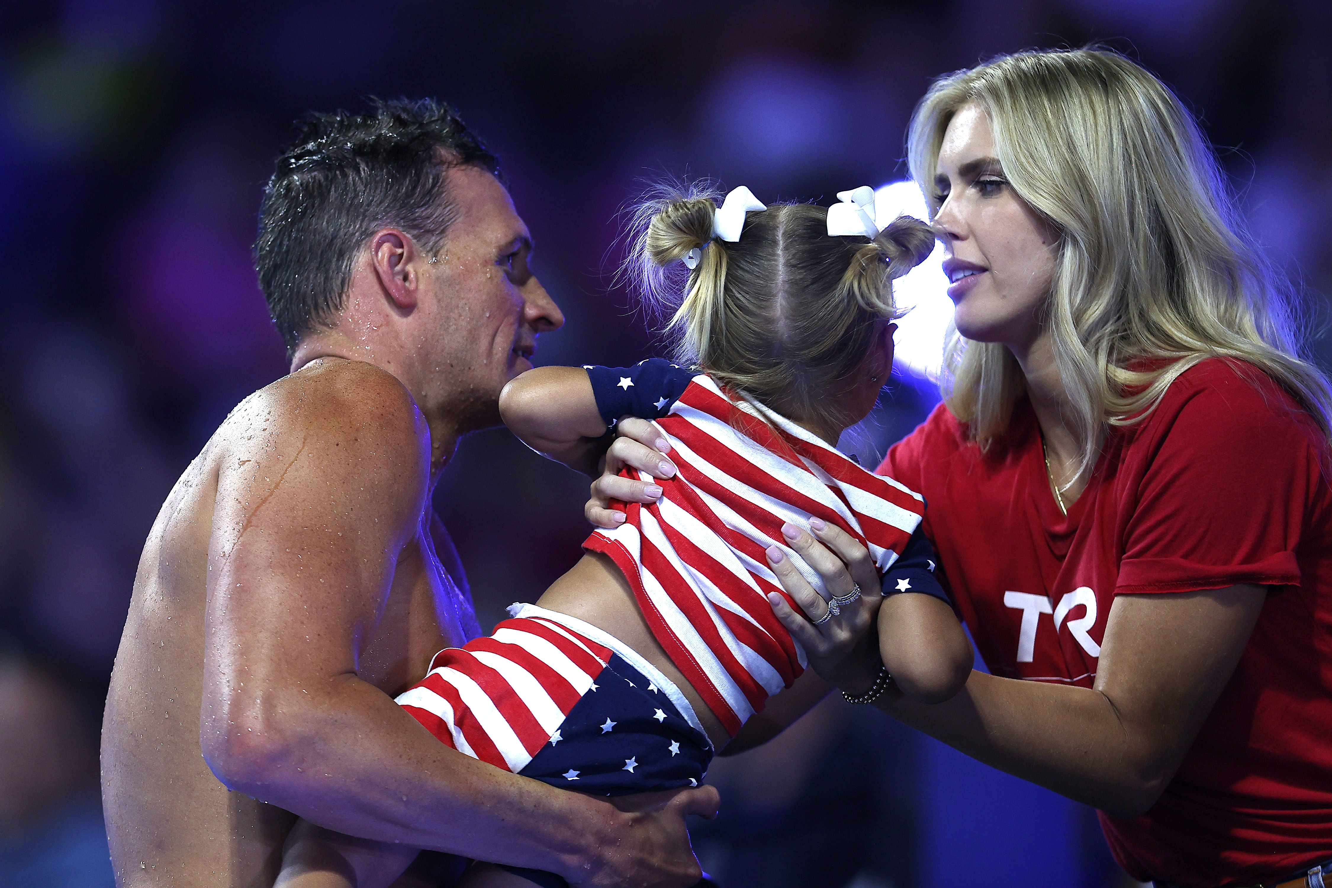Ryan Lochte of the United States holds daughter Liv Rae Lochte after competing in a semifinal heat for the Men's 200m individual medley during Day Five of the 2021 U.S. Olympic Team Swimming Trials