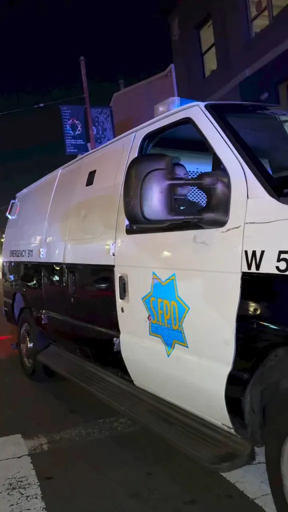 SFPD police van at night.