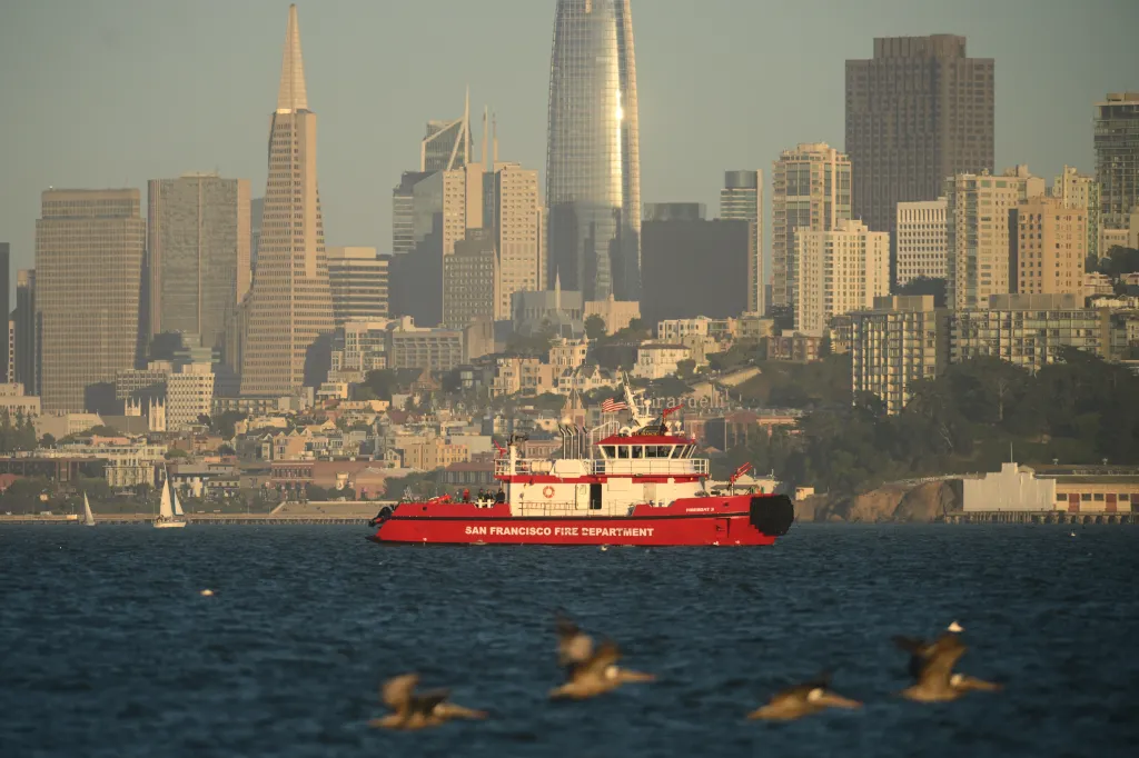 A San Francisco Fire Department vessel searches for missing victims after a boat accident near Alcatraz Island.