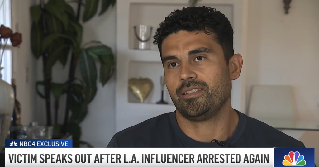A man with dark, curly hair and a beard speaks during an exclusive NBC4 interview.