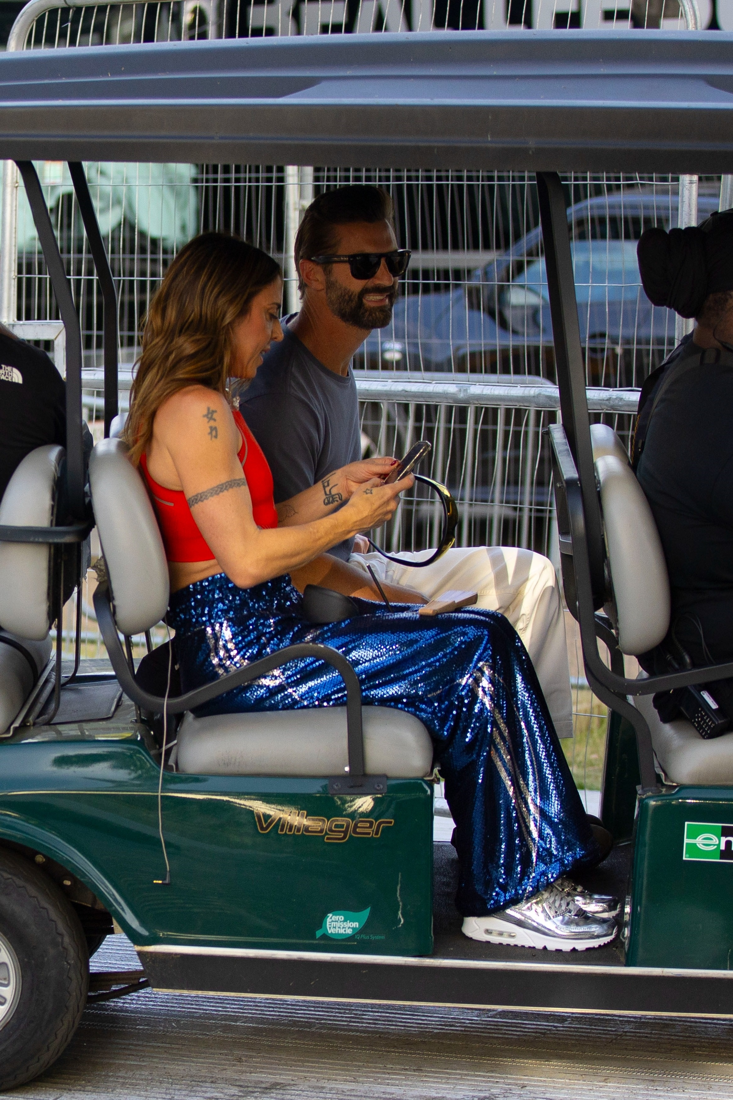 Mel C and Chris Dingwall backstage at BST Hyde Park in a golf cart.