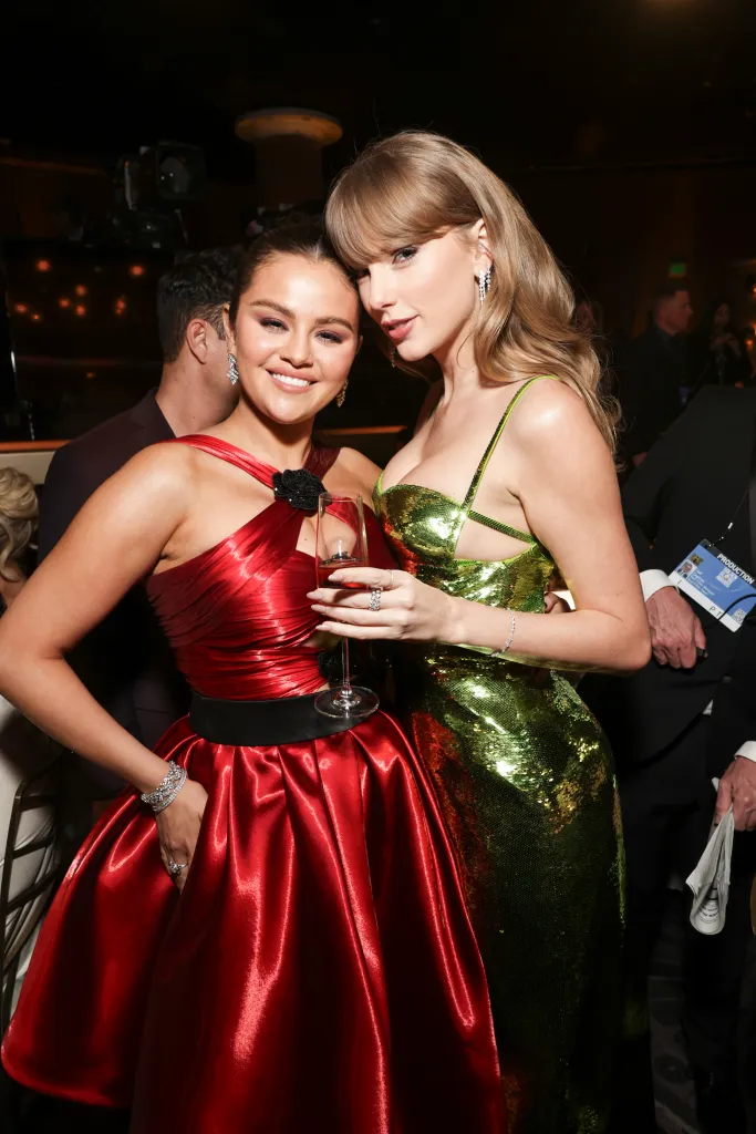 Selena Gomez and Taylor Swift smiling at the 81st Annual Golden Globe Awards.