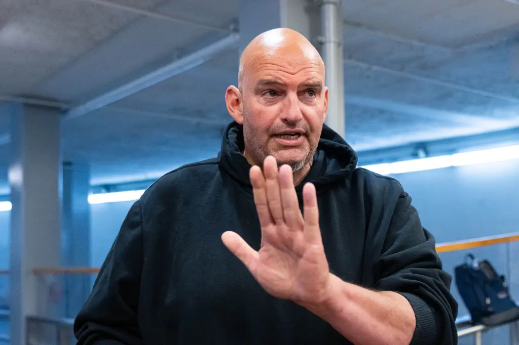 Senator John Fetterman speaking to reporters.