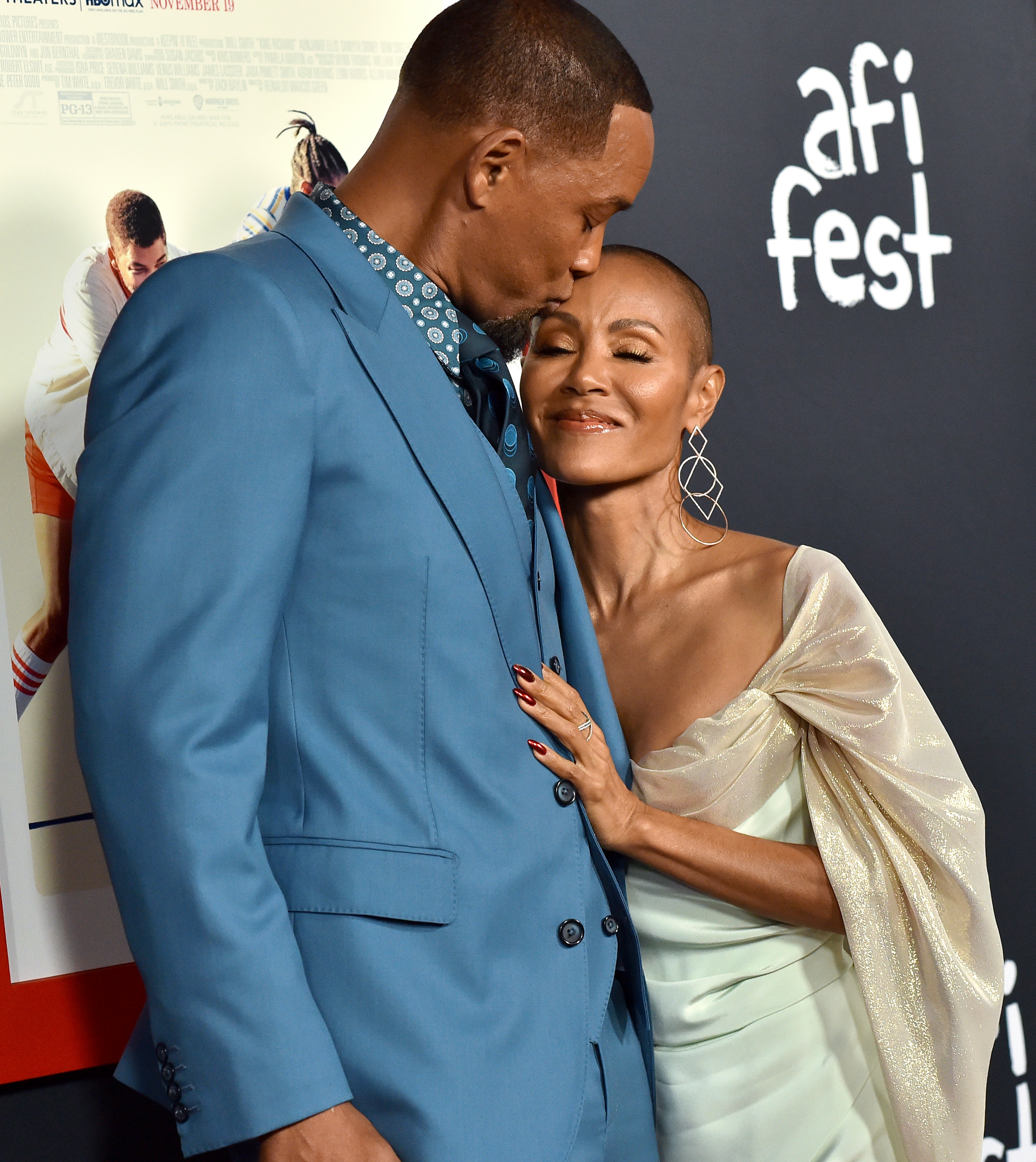 Will Smith kisses Jada Pinkett Smith on the forehead at the AFI Fest.