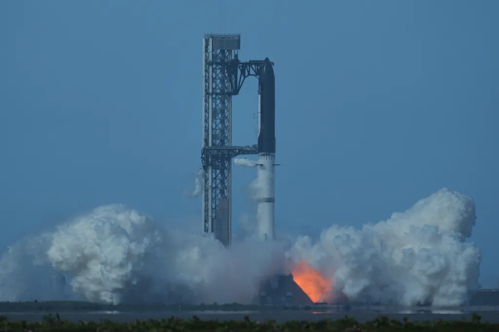 Smoke and flames shoot out from underneath SpaceX's mega rocket Starship seconds before its launch was aborted in Starbase, Texas, on July 16, 2026.