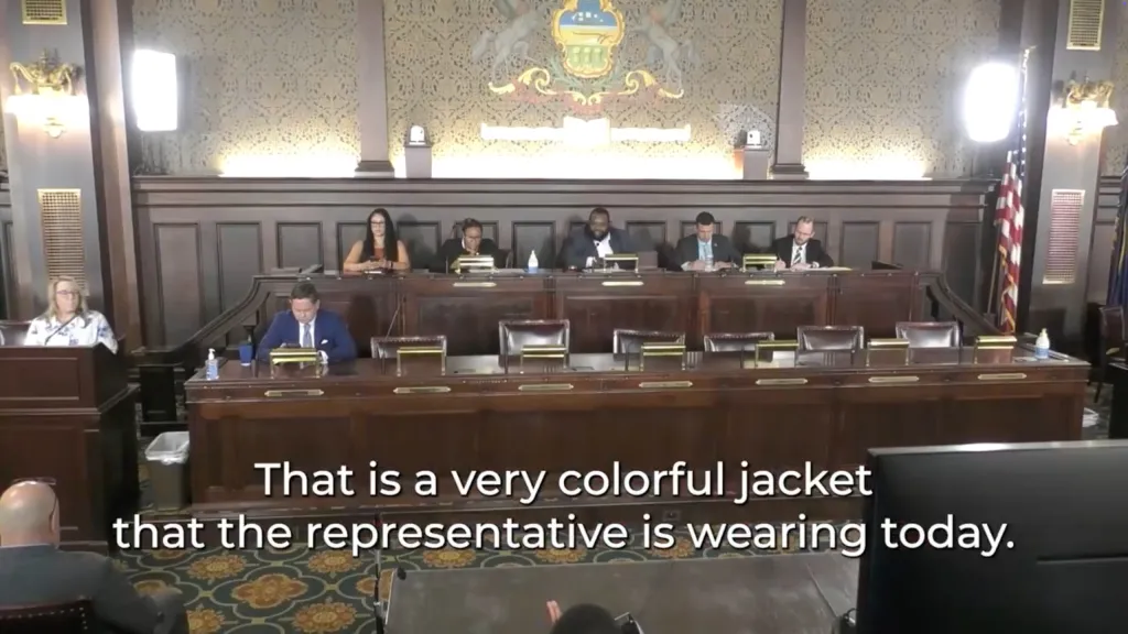 State Rep. Eric Davanzo seated in the State House chambers.