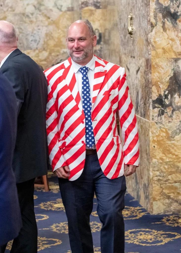 State Rep. Eric Davanzo, R-Smithton, wearing a red, white, and blue American flag suit and tie.