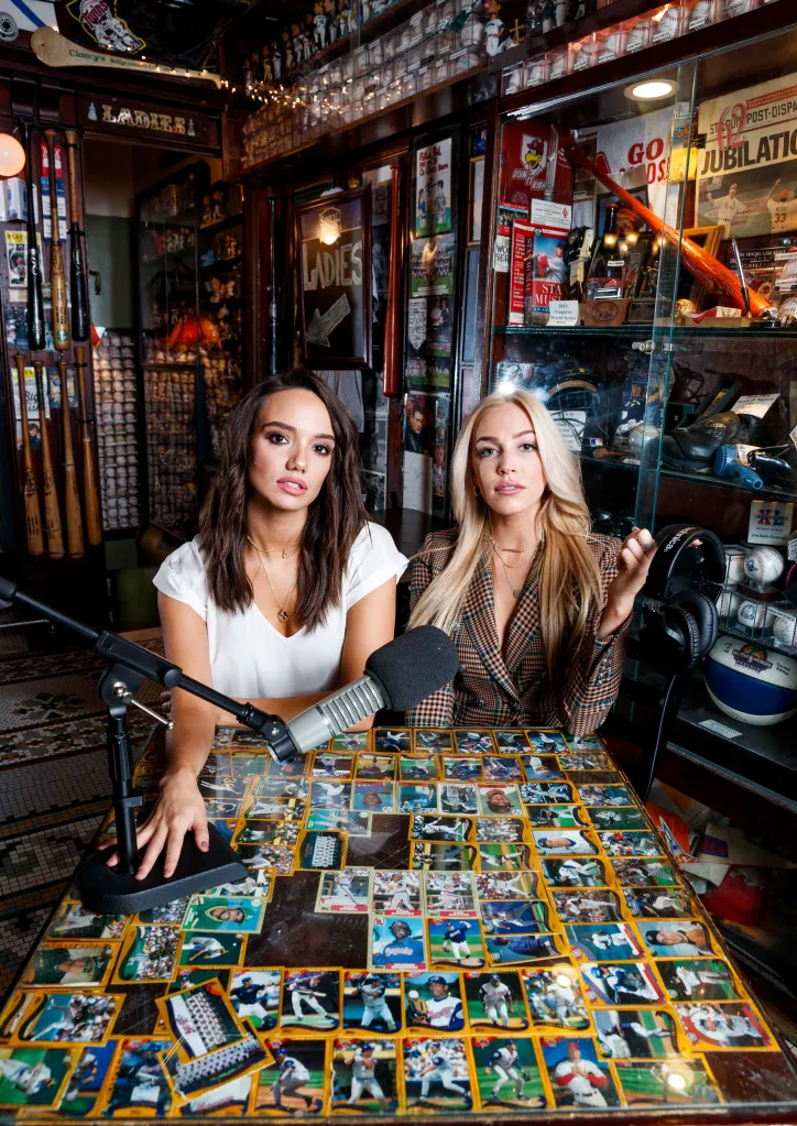 Sofia Franklyn, in a white T-shirt, and Alexandra Cooper, in a brown checked blazer, of the Barstool podcast Call Her Daddy are pictured at Foley's sports bar.