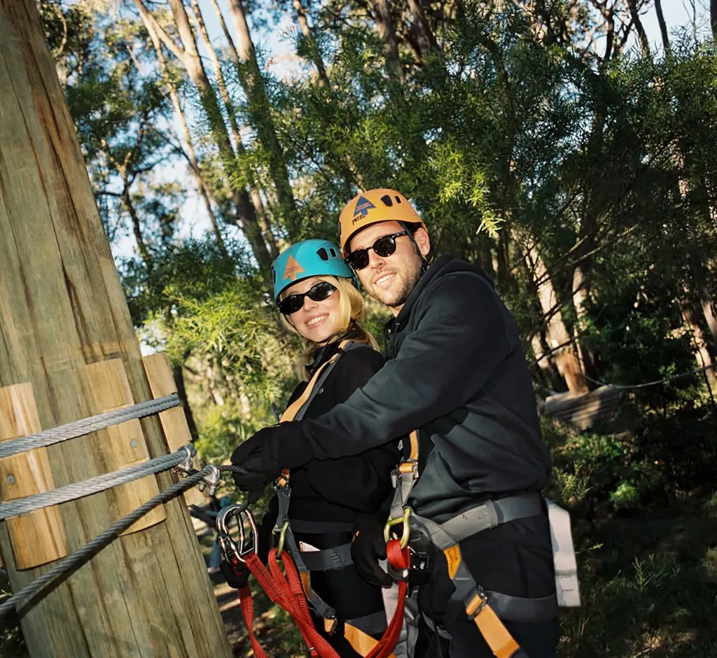 Sydney Sweeney and Scooter Braun in adventure park gear.
