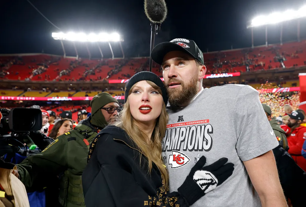 Taylor Swift and Travis Kelce celebrating at Arrowhead Stadium.
