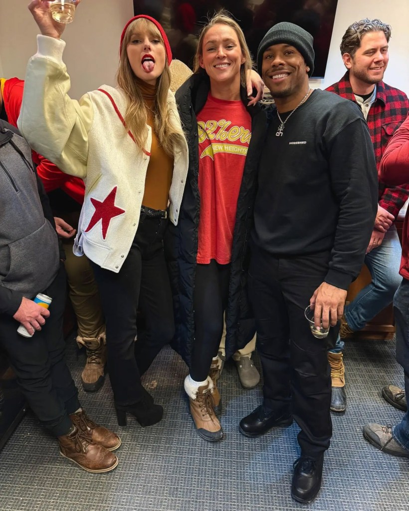 Taylor Swift with Kylie Kelce and two men in a casual gathering.