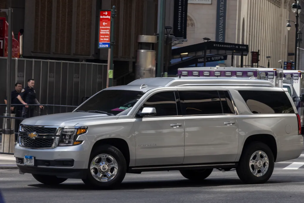 Taylor Swift's car, a silver Chevrolet Suburban, arriving at Madison Square Garden.
