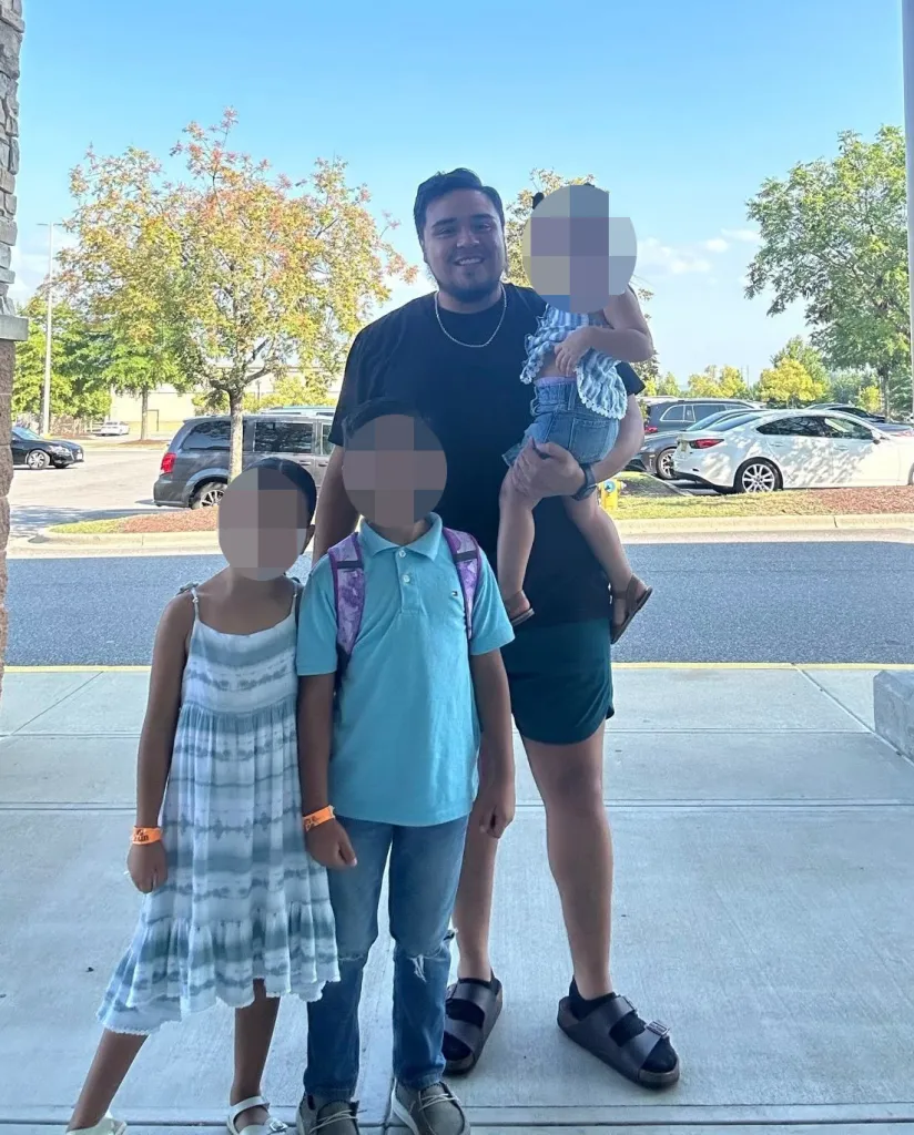 Jose Felix Alvarez-Duenas with his three children.