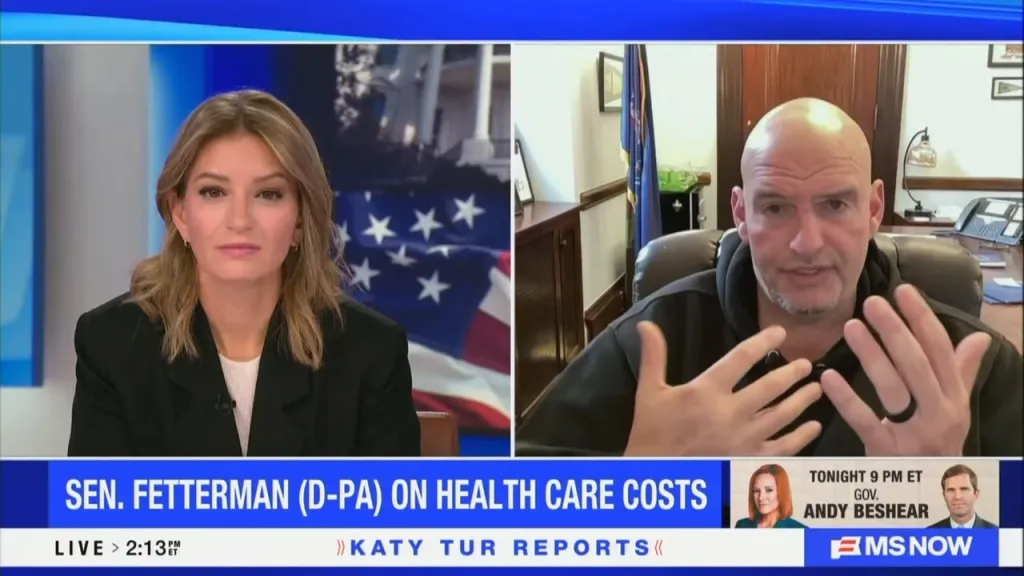Split screen of a news anchor on the left and Sen. John Fetterman on the right, speaking about healthcare costs.