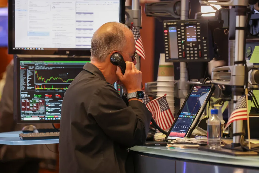 A trader works on the floor of the New York Stock Exchange in New York, New York, USA, 24 July 2026.