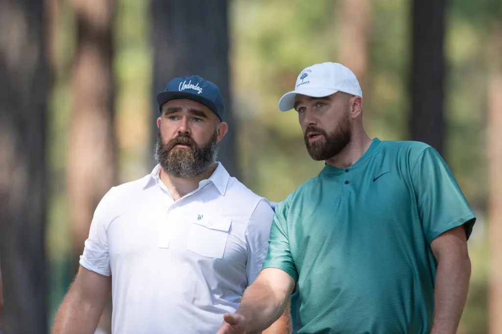 Travis Kelce and Jason Kelce at a celebrity golf championship.