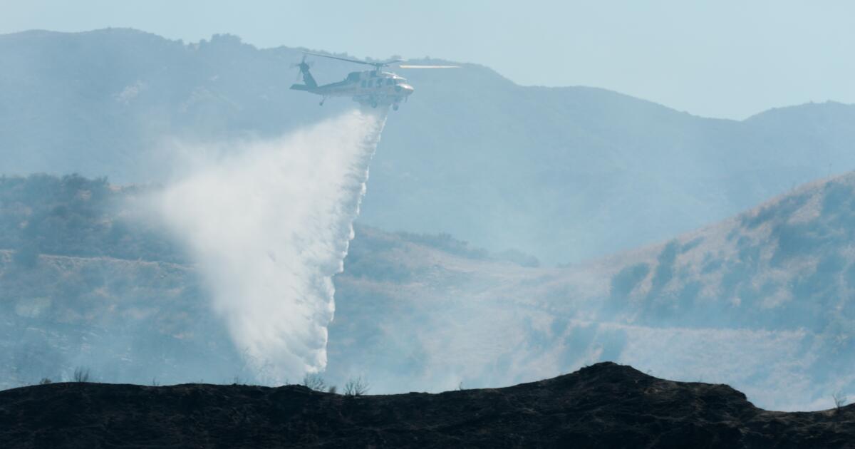 Crews make progress as Pointe fire threatens homes in Santa Clarita