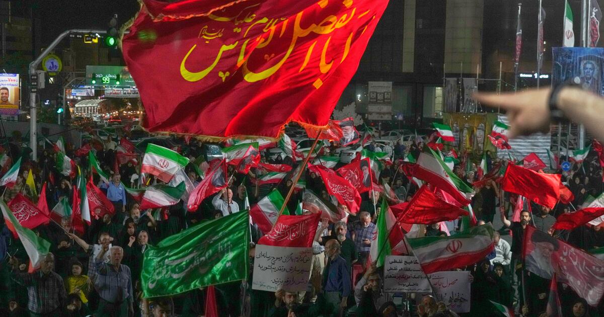 Iran says it is suspending commitments to interim deal with U.S. as they exchange attacks