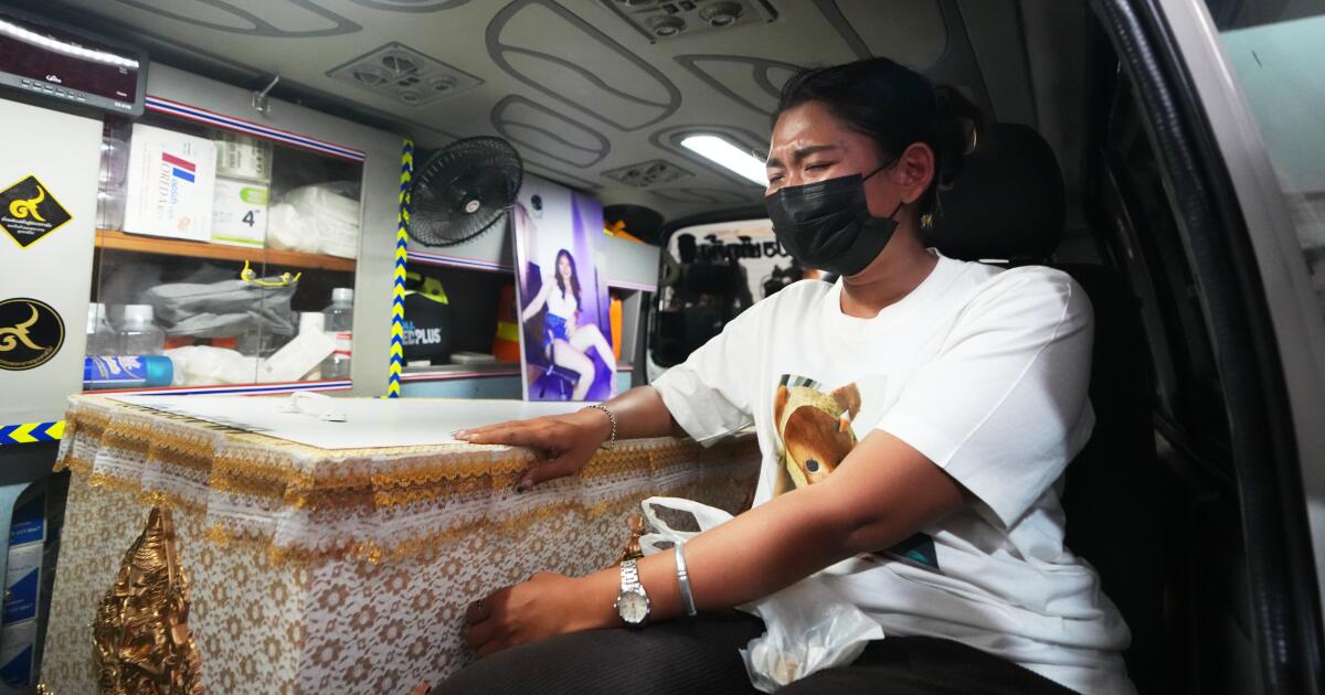 The band playing when a Bangkok bar caught fire mourns its members among the 33 dead