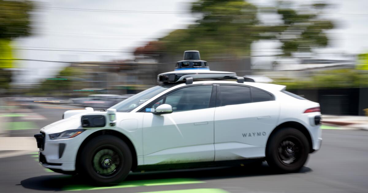 Shirtless man arrested after police say he climbed, vandalized a Waymo in East Hollywood