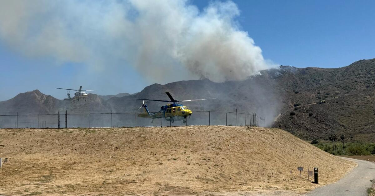 Evacuation warnings issued as more than 100 firefighters battle Lake Piru brush fire