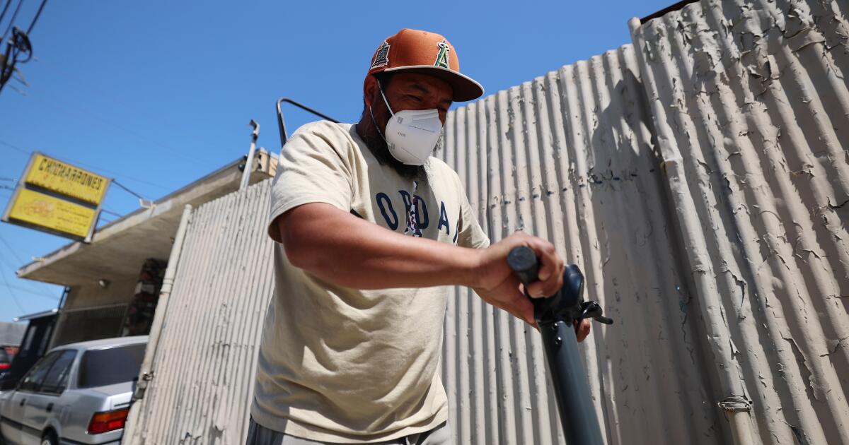 Anger grows in Boyle Heights as warehouse fire leaves stench, flies and vermin in its wake