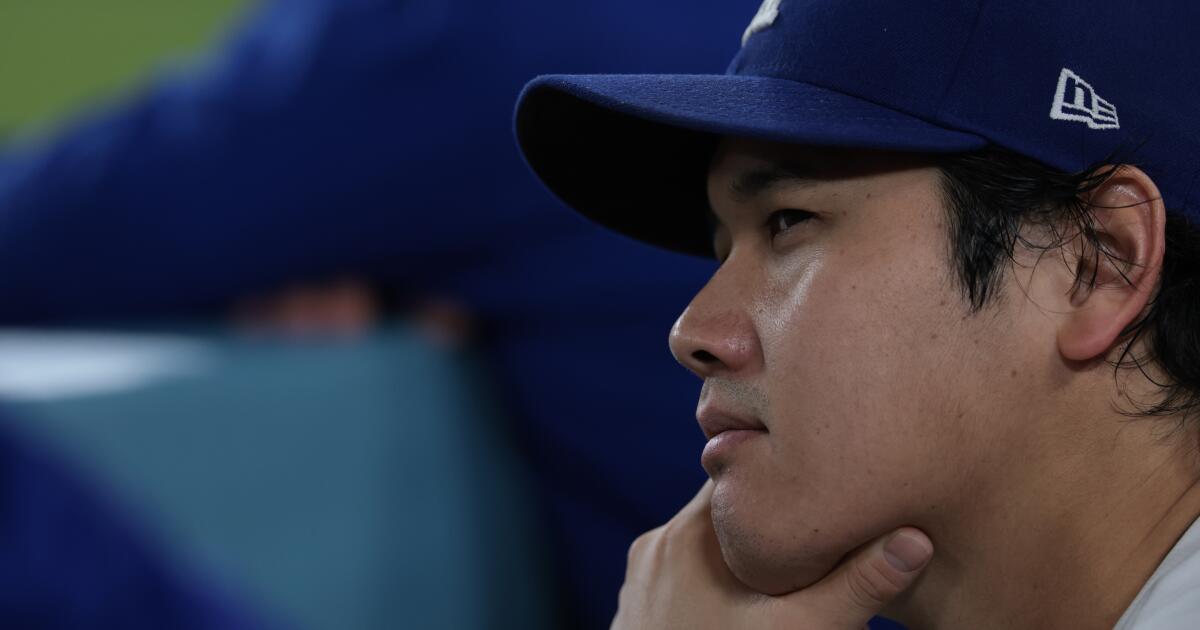 Dodgers pull Shohei Ohtani from lineup as knee problem sparks new concerns